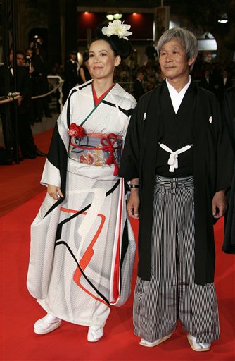 Japanese director Naomi Kawase, left, and actor Shigeki Uda arrive for the screening of the film Mogari No Mori, at the 60th International film festival in Cannes.