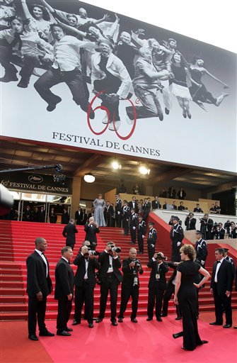 From left, Japanese director Naomi Kawase, actor Shigeki Uda, and actresses Machiko Ono and Makiko Watanabe arrives for the screening of the film Mogari No Mori, at the 60th International film festival in Cannes.