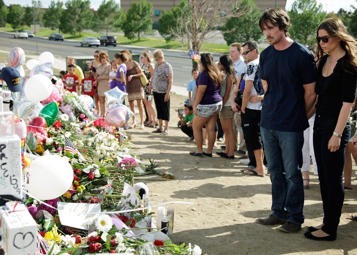 Bale and his wife offered their condolences to the victims and their families and visited the memorial near Century 16 movie theatre where the shooting took place.