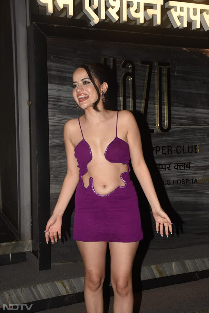 Uorfi Javed looked pretty in a purple dress as she was spotted in the city.  (Image Courtesy: Varinder Chawla)