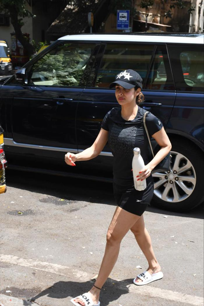 Malaika Arora was clicked at a yoga studio in Mumbai. (Image courtesy: Varinder Chawla)