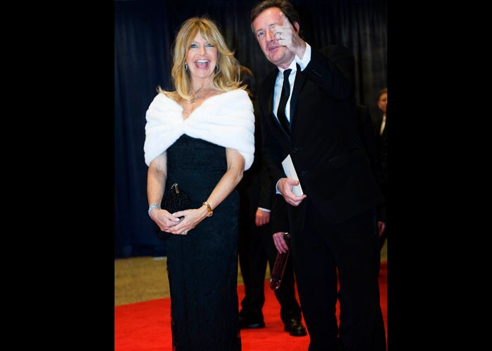 Goldie Hawn arrives with Piers Morgan at the dinner.