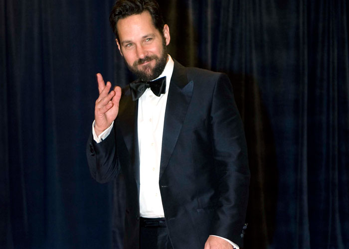 Actor Paul Rudd gestures towards the camera.