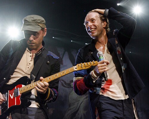 <b>Jamming</b>: Chris Martin and Jonny Buckland performing together.