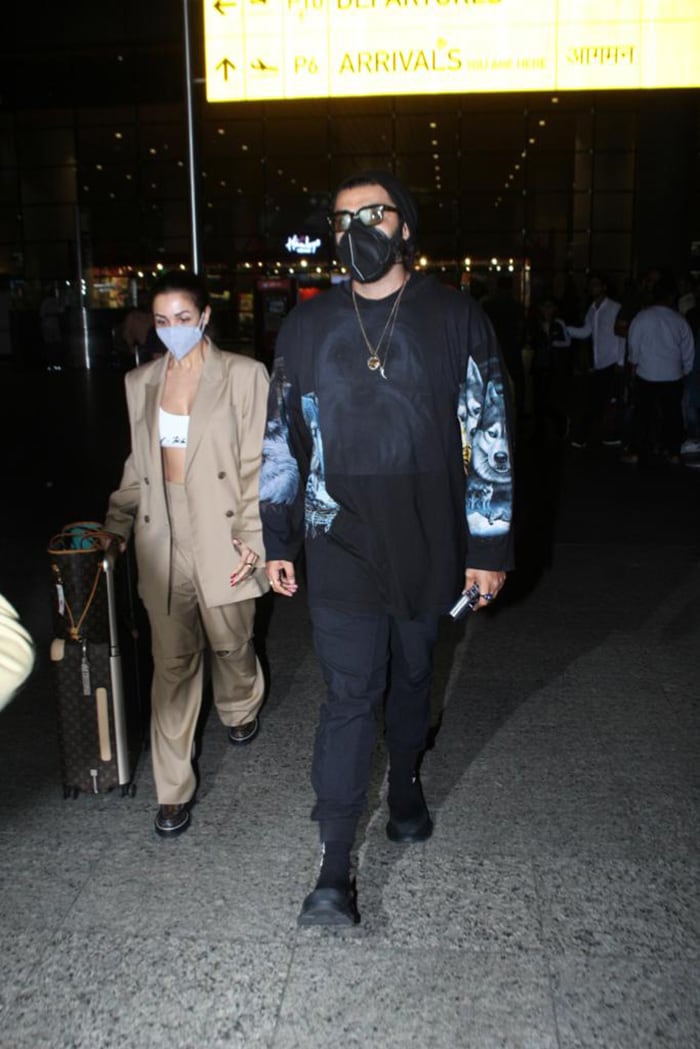 We loved Malaika Arora and Arjun Kapoor's airport looks.