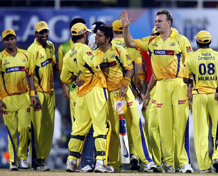 Chennai Super Kings' players celebrate their victory over Deccan Chargers during the IPL second semi-final match at D Y Patil Stadium in Navi Mumbai. (PTI Photo)