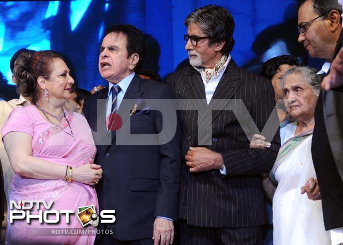 Big B listens as Dilip Kumar talks to wife Saira Banu.