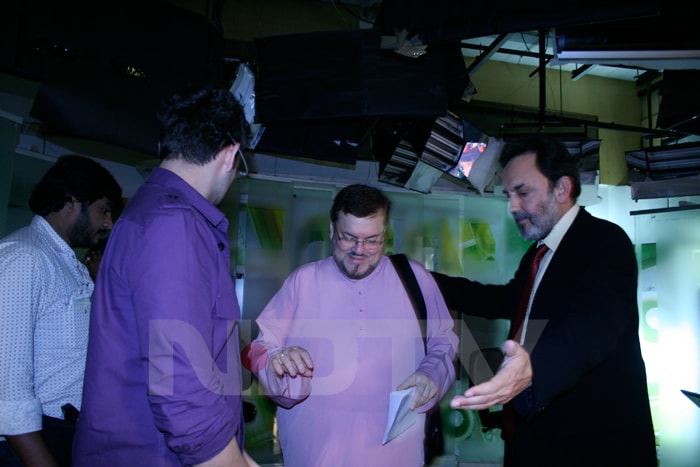 Neil and Nitin Mukesh with NDTV's Prannoy Roy.