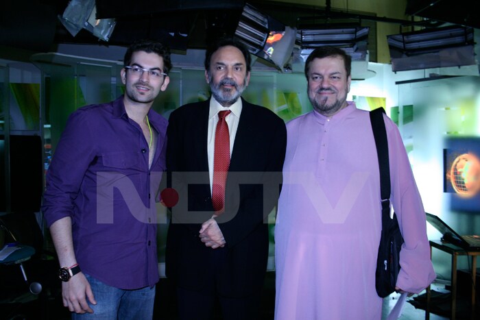 Neil, NDTV's Prannoy Roy and Nitin Mukesh pose for the camera.