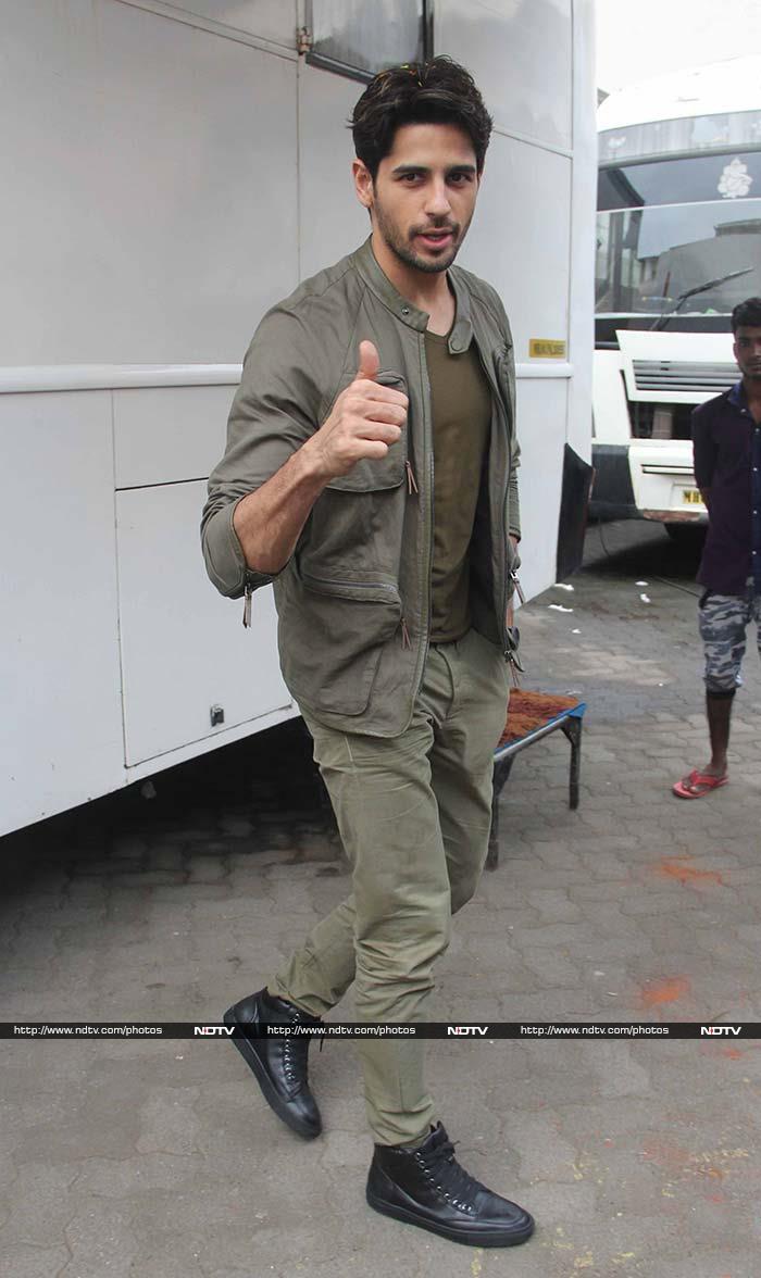 At the studio, Sidharth Malhotra posed with a thumbs-up.