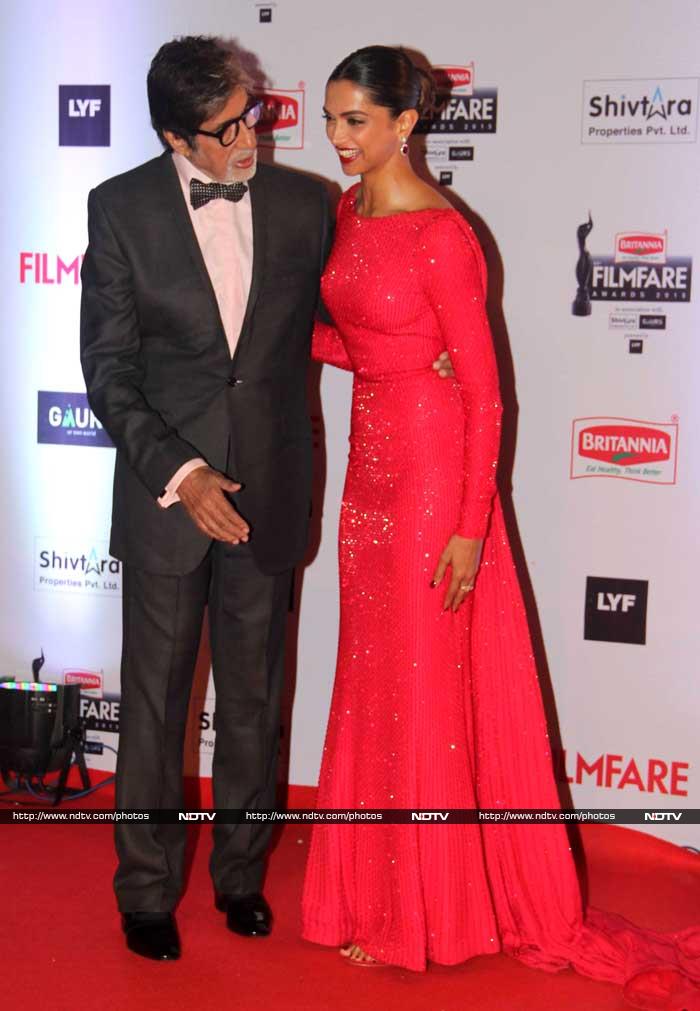 Deepika walked the IIFA red carpet this year looking like a scarlet princess in a flowy Ralph and Russo. She was greeted with her <I>Piku</i> co-star Amitabh Bachchan.