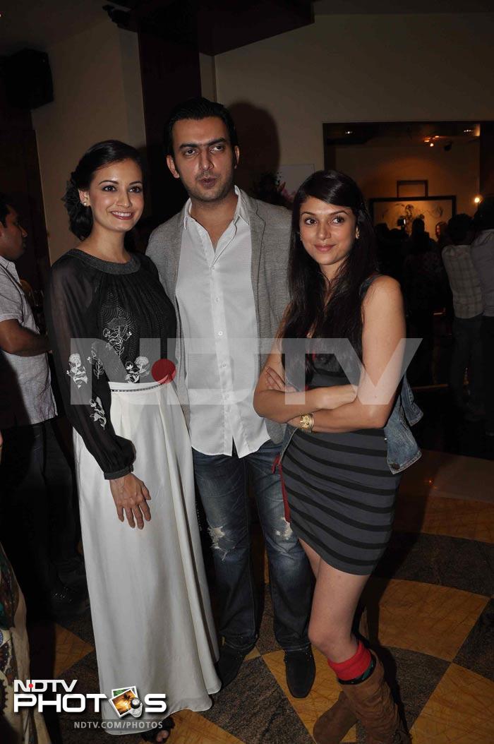 Dia Mirza looked beautiful at an art event in Mumbai. In this picture, she poses with her beau Sahil Sangha and Aditi Rao.