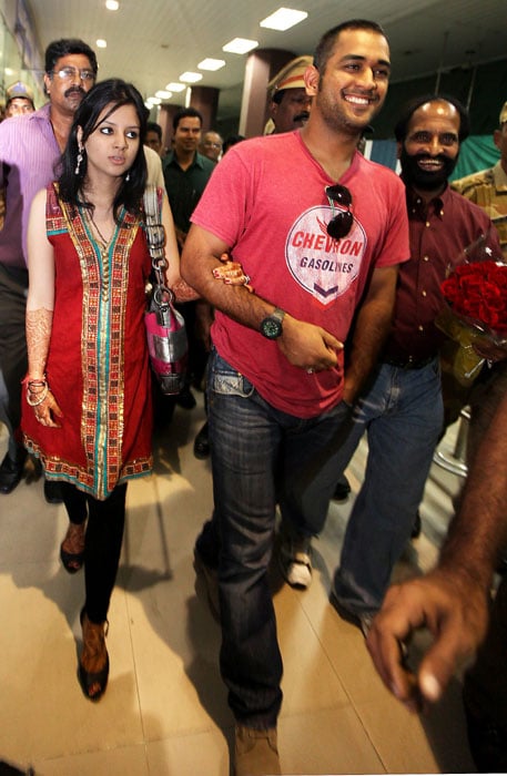 Dhoni and Sakshi post marriage