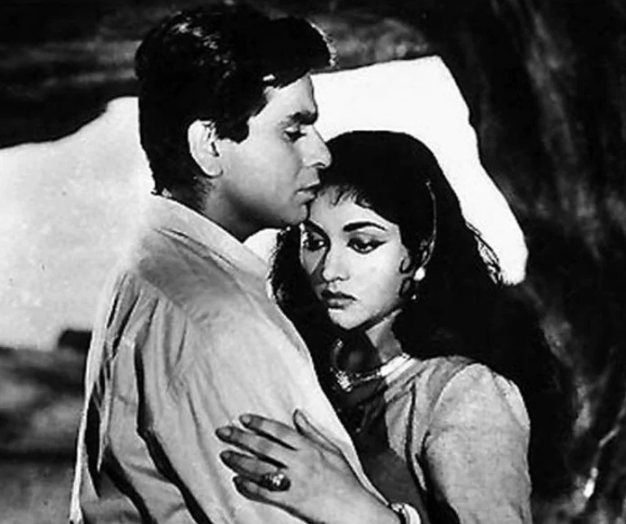 Dilip Kumar was next seen in Bimal Roy's Madhumati (1958) which dealt with the subject of reincarnation. One of his most commercially successful films, Madhumati provided the inspiration for Shah Rukh Khan's <i>Om Shanti Om</i>.