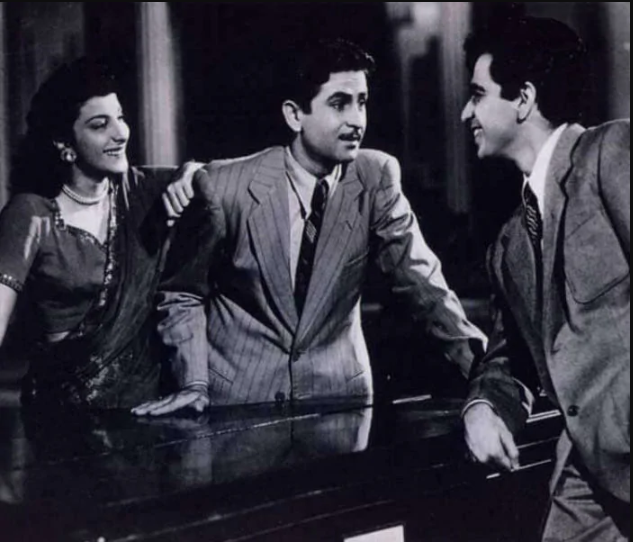 Dilip saab's performance in <i>Andaz</i> (1949), opposite the equally legendary Raj Kapoor, earned him critical acclaim as well as box-office success. With Raj Kapoor and Dev Anand, he formed one-third of the trinity that ruled Indian cinema, just emerging from the shadow of British rule, for two decades.