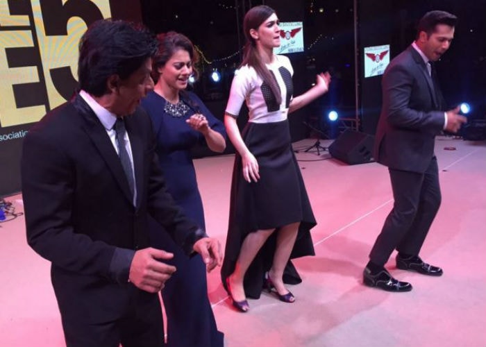 Actors Shah Rukh Khan, Kajol, Varun Dhawan and Kriti Sanon took the promotions of their upcoming film <i>Dilwale</i>, which releases on December 18, to Dubai. There, they shook a leg for the crowd which cheered endlessly for their favourite stars. <br><br>This image was posted on Twitter by <a href="https://twitter.com/SRKFC1" target="_blank" rel="nofollow" >@SRKFC1</a>