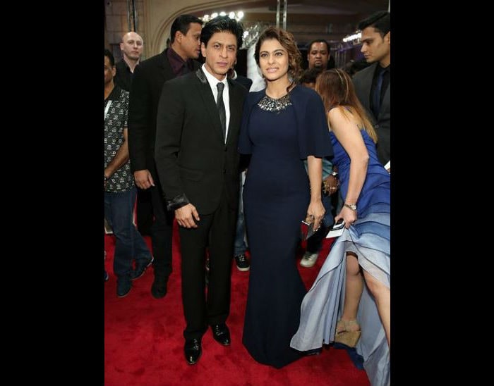 Kajol looked elegant in a dress by Georges Chakra while Shah Rukh was suave in a black suit. <br><br>This image was posted on Twitter by <a href="https://twitter.com/SRKFC1" target="_blank" rel="nofollow" >@SRKFC1</a>