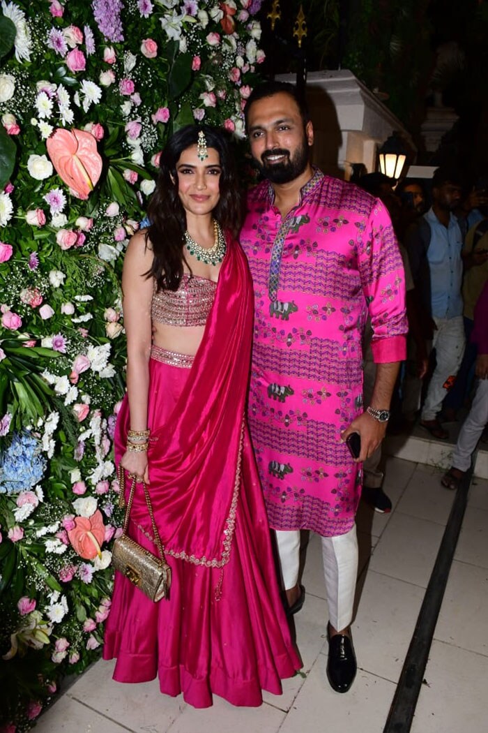 Karishma Tanna and her husband Varun Bangera twinned in pink outfits. (Image Courtesy: Varinder Chawla)