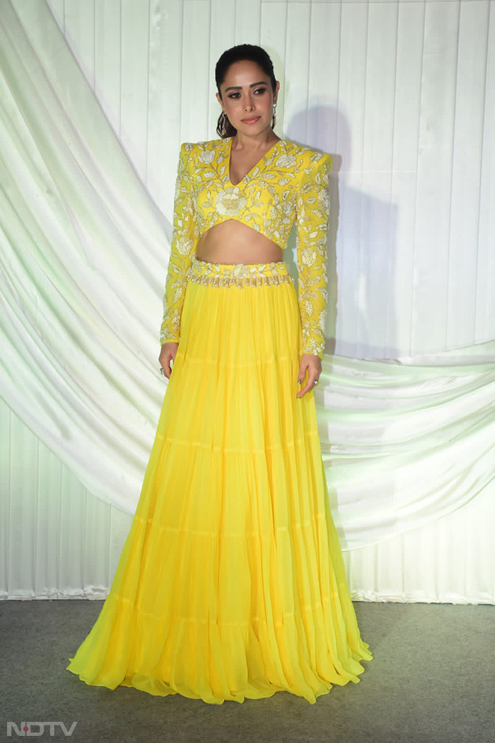 Nushrratt Bharuccha looked gorgeous in a lemon-yellow <i>lehenga</i>.  (Image Courtesy: Varinder Chawla)