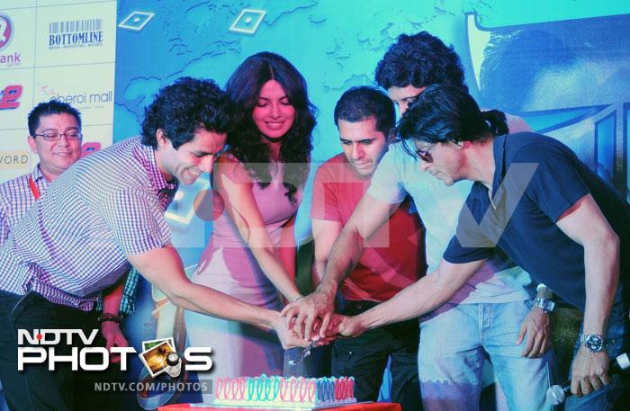 Shah Rukh Khan, Priyanka Chopra, Farhan Akhtar, Ritesh Sidhwani and Sahil Shroff cutting cake during the launch.