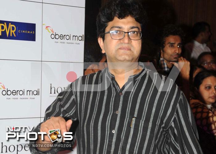 Well-known lyricist Prasoon Joshi walks in.