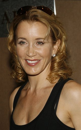 Actress Felicity Huffman arrives at the premiere of Evening.