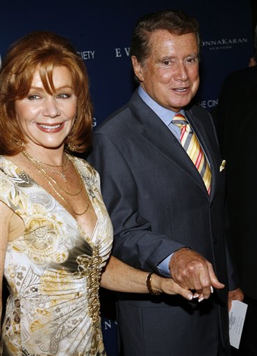 Regis Philbin and his wife Joy, left, arrive at the premiere of Evening.