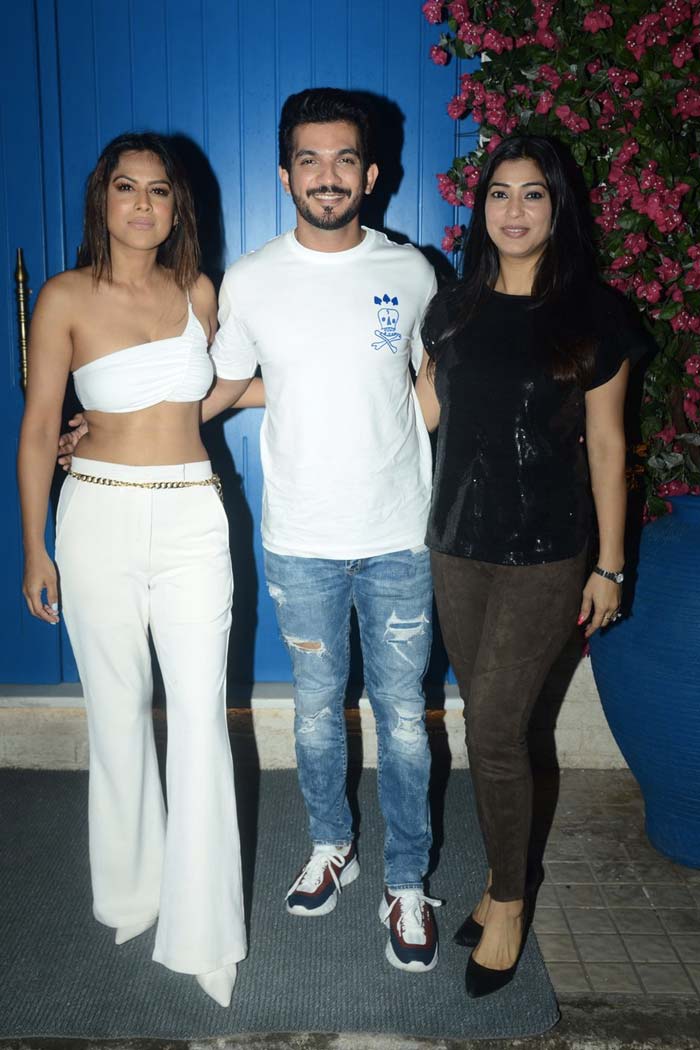 TV star Nia Sharma posed with Arjun Bijlani and his wife Neha Swami.