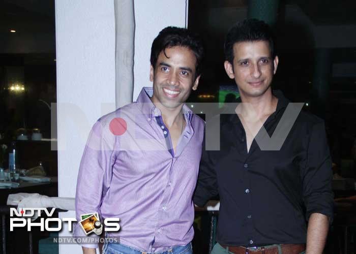 Tusshar Kapoor and Sharman pose together.