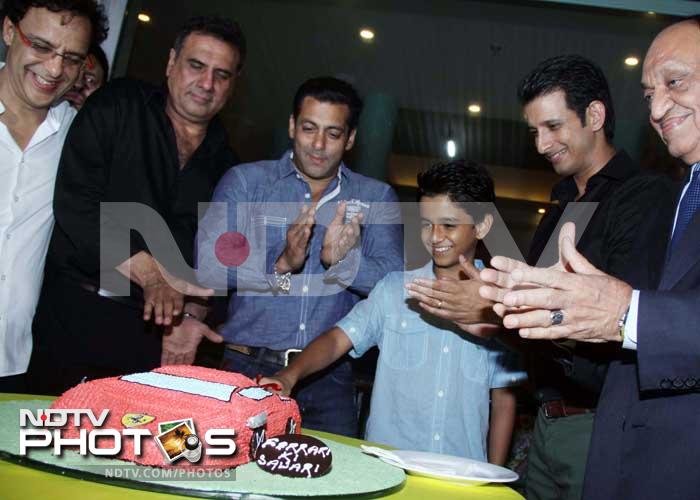 Child artist Ritvik Sahore cuts the cake.