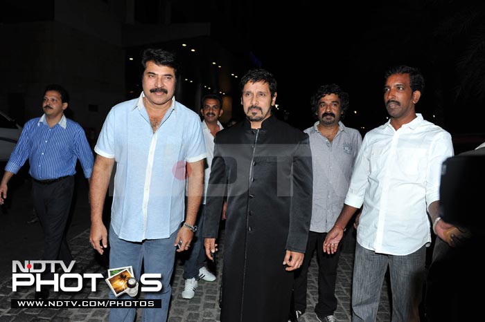 Mammootty and Vikram arrive for the celebrations.