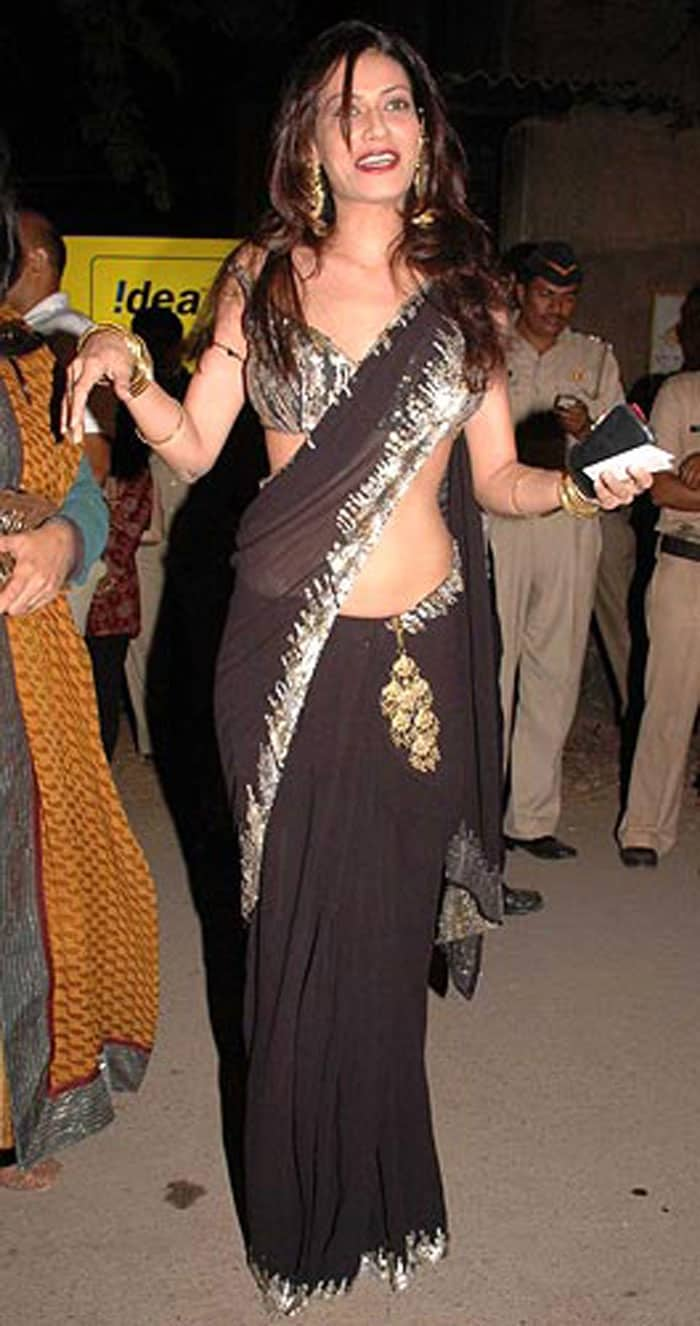 Payal Rohatgi, 2009: She didn't find the right dress so Payal grabbed some bin liners and foil from her kitchen. But what is that hideous gold dangler? All in all, Payal looks the Real Housewife from the Basti