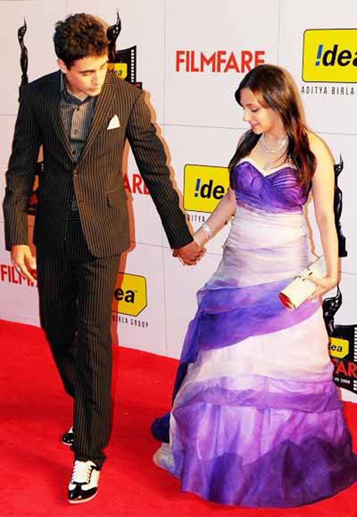 Imran Khan, Avantika Malik, 2009: Avantika's tiny frame is floating in a cloud of fabric. The colours and the accessories could have made a good ensemble, but she just ends looking like a Disney princess at the wrong prom.