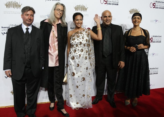 Members of the Jury of the Middle East International Film Festival (MEIFF) from (L to R) James Longley, Joslyn Barnes, Hind Sabri, Rashid Masharawi and his wife pose together before the opening of the Middle East International Film Festival (MEIFF) in Abu Dhabi, on October 8, 2009. (Photo: AFP)