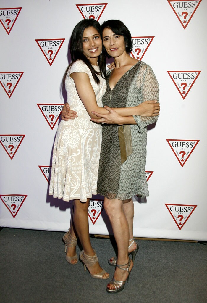 Actresses Freida Pinto and Hiam Abbass attend Guess Portrait Studio during the 2010 Toronto International Film Festival at the Hyatt Regency in Toronto, Canada.