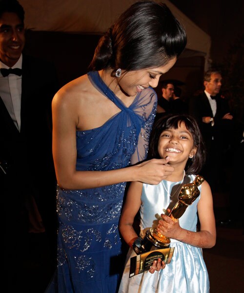 Frieda shares a moment with Rubina Ali who plays the young Latika in <I>Slumdog Millionaire</i>. Frieda plays the older Latika, Jamal's (Dev Patel) love interest in the film.