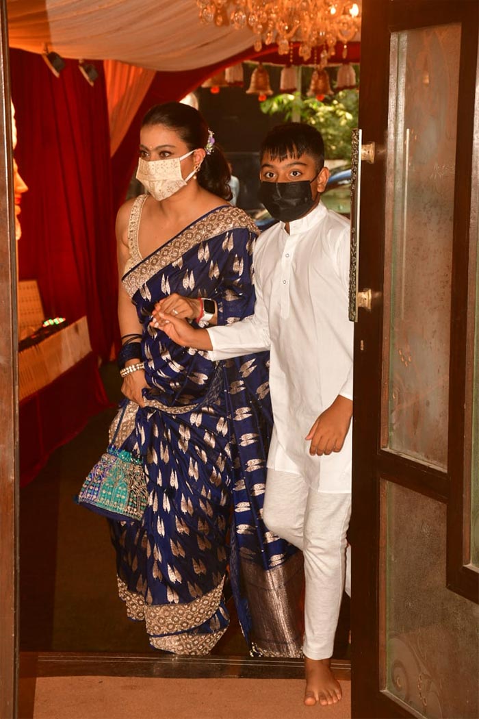 Kajol was photographed with son Yug at the <i>puja</i>.