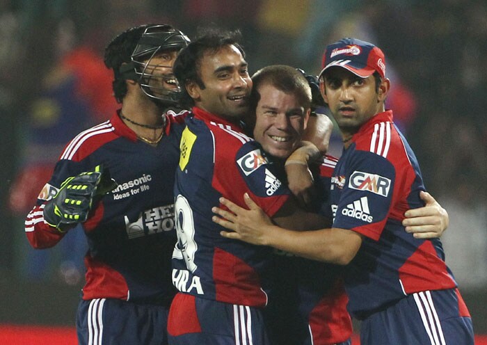 David Warner celebrates with teammates after he ran out Shane Warne of the Rajasthan Royals during the IPL match between Delhi Daredevils and Rajasthan Royals played at Feroz Shah Kotla Stadium in Delhi. (Getty Photo)