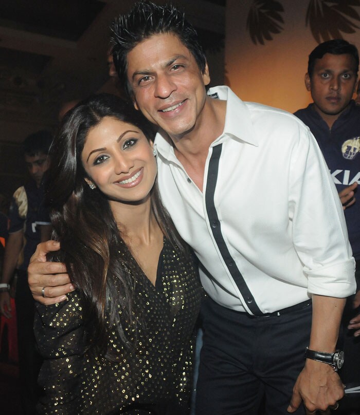 Shilpa Shetty poses with Shah Rukh Khan at the IPL Nights after party following the 2010 DLF Indian Premier League T20 group stage match between the Kolkata Knight Riders and Rajasthan Royals at the ITC Sonar Bangla on April 17, 2010 in Kolkata, India.  (Photo: IPL2010/Getty Images)