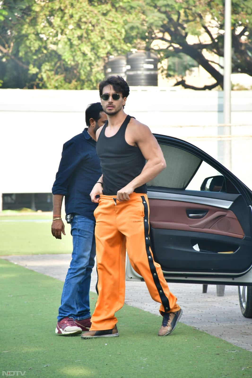 Tiger Shroff clicked at the match in the city. (Image courtesy: Varinder Chawla)