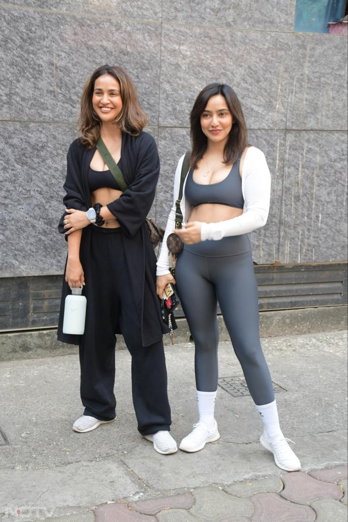 Neha and Aisha Sharma were all smiles as they were photographed outside their gym. (Image courtesy: Varinder Chawla)