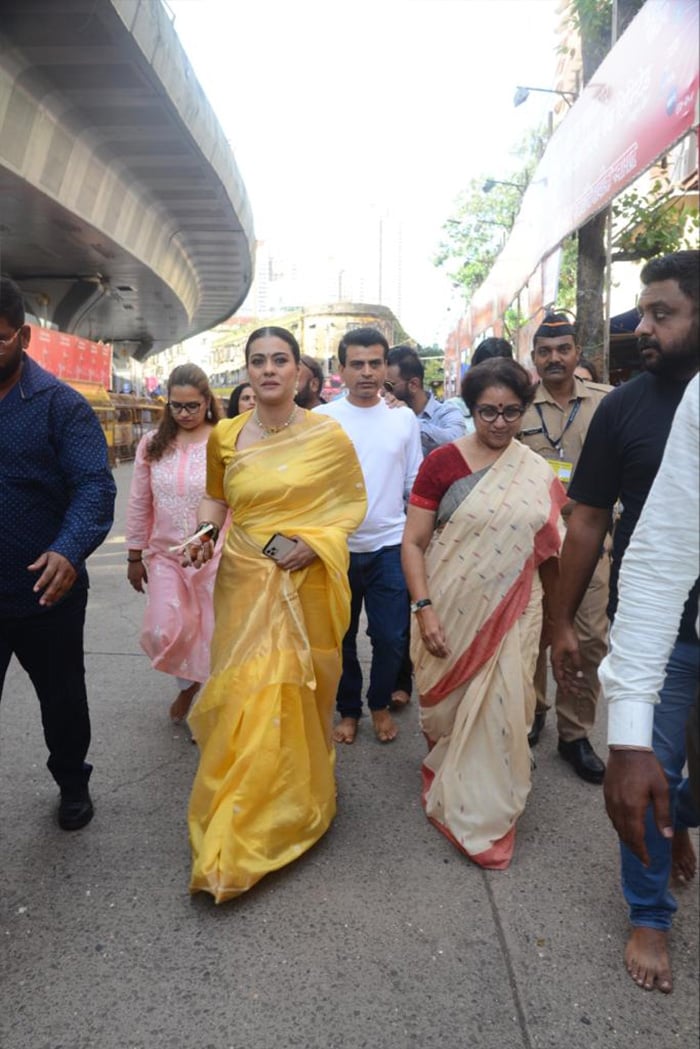 Kajol picked a yellow <i>saree</i> for the festivities.