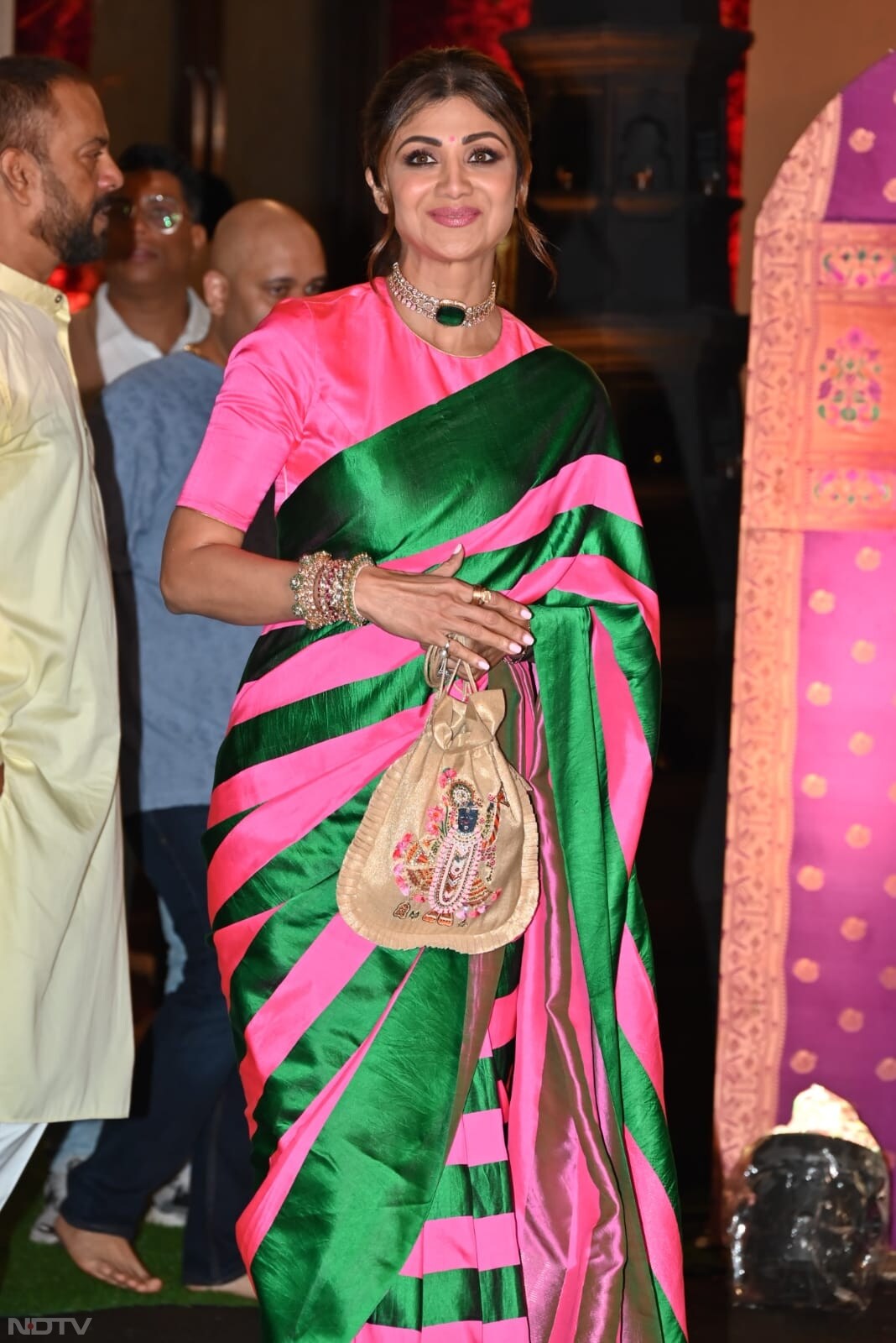 Shilpa Shetty looked pretty in a green and pink saree. (Image courtesy: Varinder Chawla)