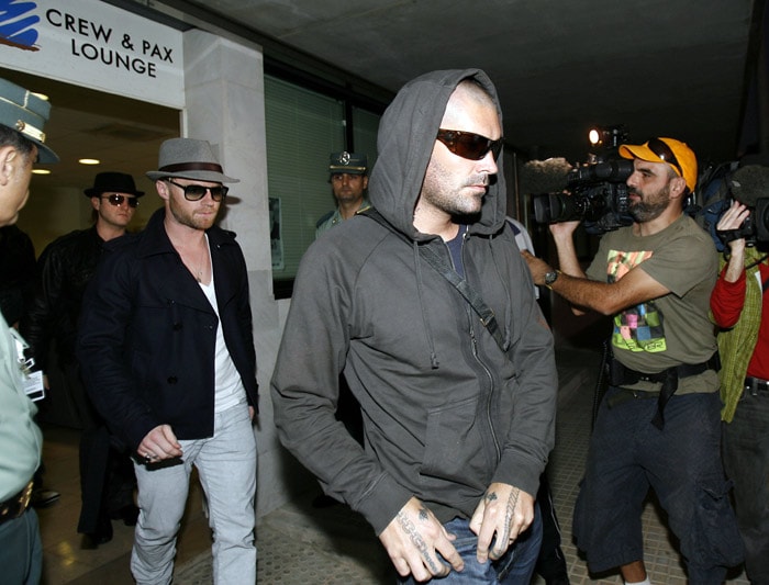 Members of music band Boyzone arrive at Palma de Mallorca's Airport on October 11, 2009, a day after, lead singer Stephen Gately died on the Spanish island of Majorca. Gately went on to appear variously in successful stage productions and on television programmes as well as contributing further solo tracks to various compilations and soundtracks. In 2008, he rejoined his colleagues as Boyzone reformed for a series of concerts and recordings. (Photo: AFP)