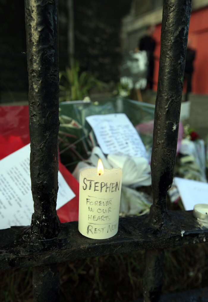 A lit candle sits outside St Laurence O'Toole's Church in Dublin, on October 17, 2009 during a church service for Stephen Gately. An autopsy on Stephen Gately revealed that he died due to excess fluid in his lungs, a court spokeswoman on the Spanish island of Majorca said on October 13. Gately, 33, was found dead on October 10 in his apartment in the Majorcan town of Port Andratx while on holiday on the Mediterranean island. News reports said he had been out late the night before. Gately, who married his partner Andrew Cowles in a civil union in 2006, sent ripples through the pop music world 10 years ago when he announced that he was gay. (Photo: AFP)