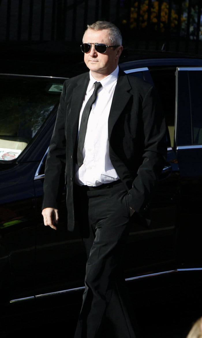 Irish music manager Louis Walsh arrives for the funeral of Stephen Gately at St Laurence O'Toole Church in Dublin, on October 17, 2009. An autopsy on Stephen Gately revealed that he died due to excess fluid in his lungs, a court spokeswoman on the Spanish island of Majorca said on October 13. Gately, 33, was found dead on October 10 in his apartment in the Majorcan town of Port Andratx while on holiday on the Mediterranean island. News reports said he had been out late the night before. Gately, who married his partner Andrew Cowles in a civil union in 2006, sent ripples through the pop music world 10 years ago when he announced that he was gay. (Photo: AFP)