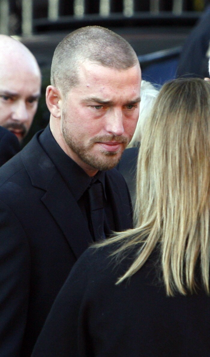 Andrew Cowles, Stephen Gately's partner is pictured outside St Laurence O'Toole's Church in Dublin, on October 17, 2009. An autopsy on Stephen Gately revealed that he died due to excess fluid in his lungs, a court spokeswoman on the Spanish island of Majorca said on October 13. Gately, 33, was found dead on October 10 in his apartment in the Majorcan town of Port Andratx while on holiday on the Mediterranean island. News reports said he had been out late the night before. Gately, who married his partner Andrew Cowles in a civil union in 2006, sent ripples through the pop music world 10 years ago when he announced that he was gay. (Photo: AFP)