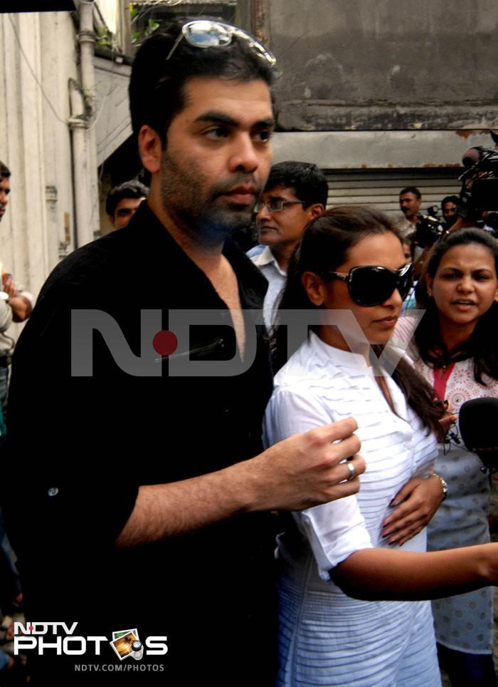 Filmmaker Karan Johar with actress Rani Mukherjee at the funeral.