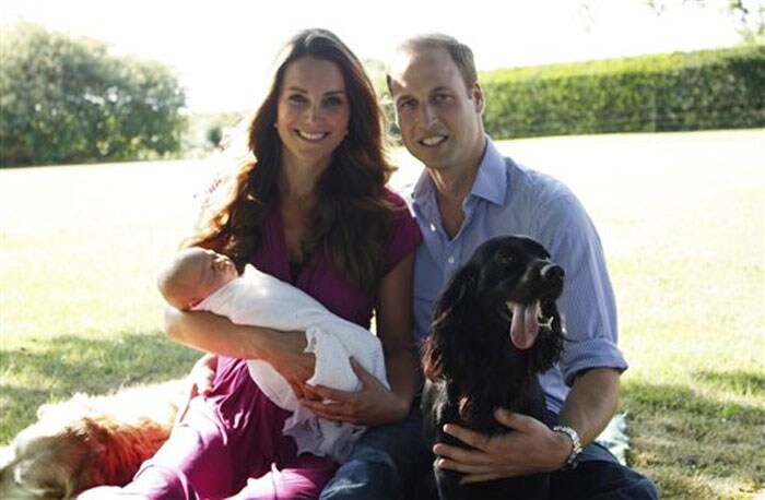 It was almost a month before we got another look at Baby George, when his first official Royal portrait was released. The photograph, taken by Kate's father Michael Middleton, also features the family pets Tilly and Lupo and was taken in the Middletons' garden.