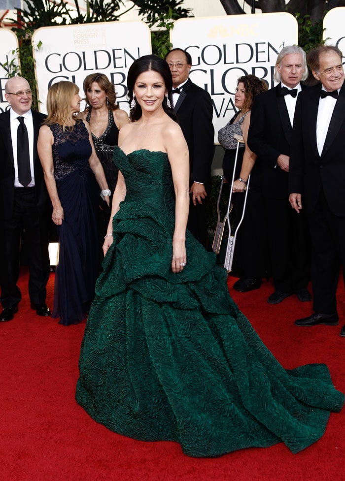 Catherine was in a striking, green Monique Lhuillier  gown, along with diamond chandelier earrings.